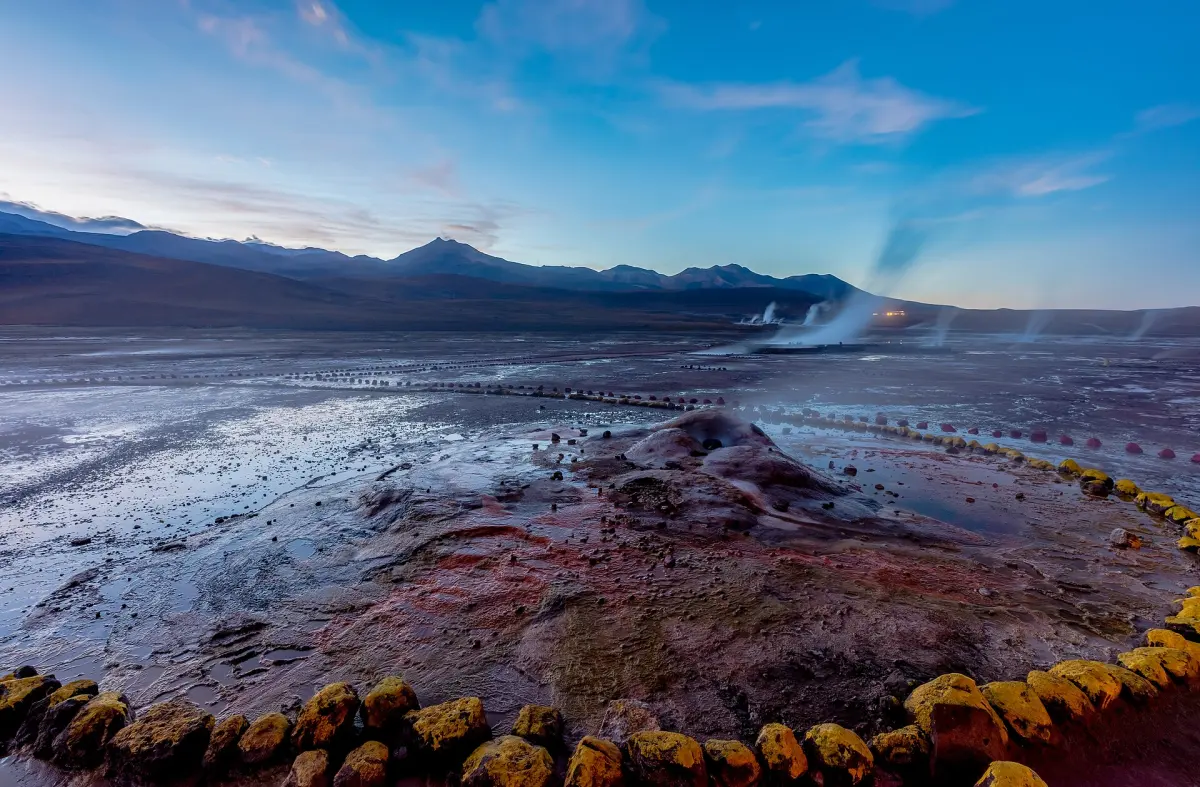 Steam rising from El Tatio geysers at dawn